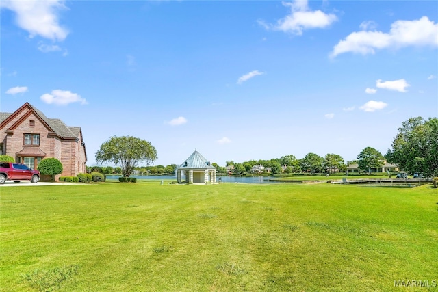 view of yard with a water view