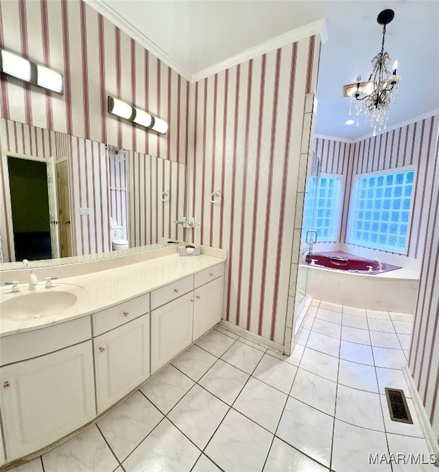 bathroom with a tub to relax in, vanity, an inviting chandelier, toilet, and ornamental molding