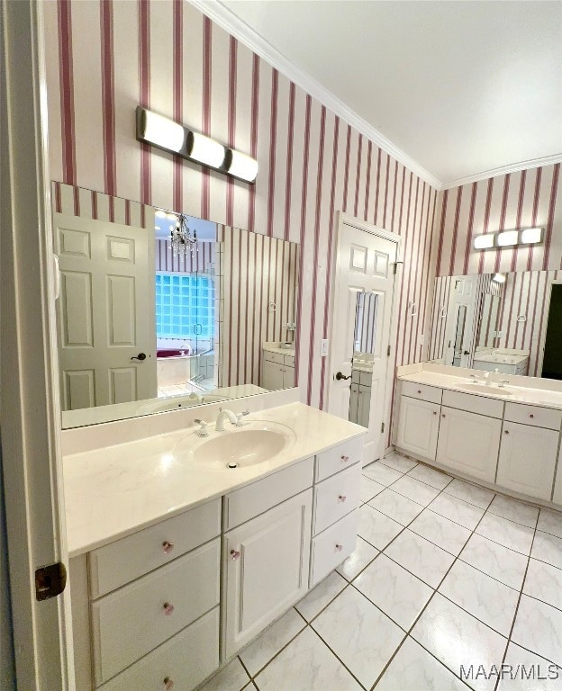 bathroom with crown molding and vanity