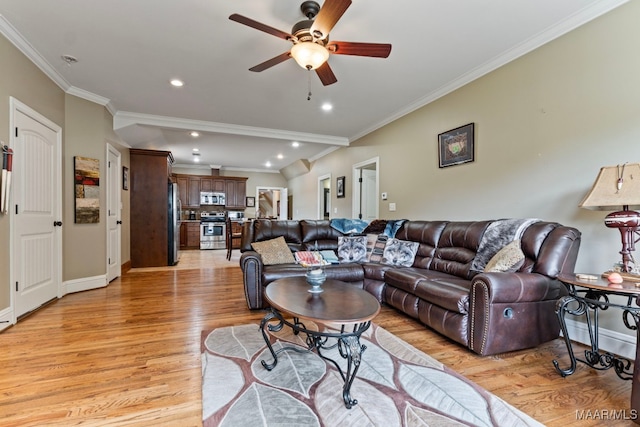 living area with recessed lighting, light wood-type flooring, and crown molding