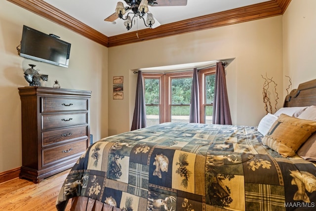 bedroom with ornamental molding, access to outside, light wood-style floors, and ceiling fan