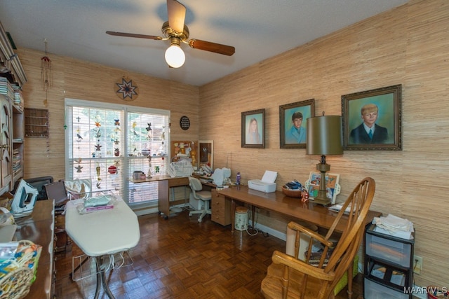 office featuring parquet floors and ceiling fan