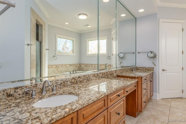 bathroom featuring tile patterned flooring, vanity, independent shower and bath, and ornamental molding