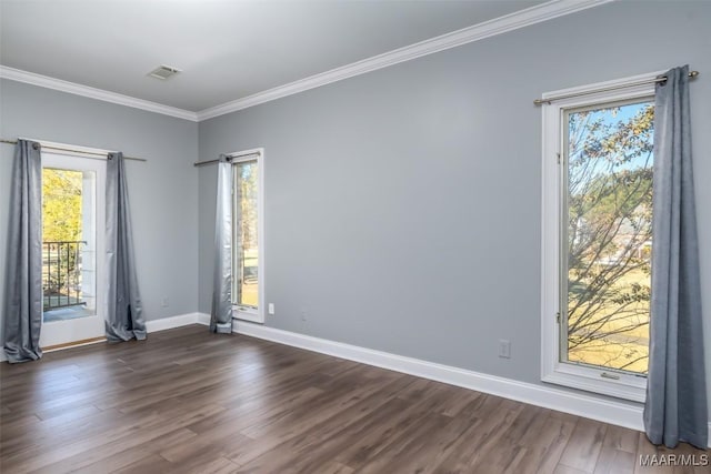 unfurnished room with crown molding and dark wood-type flooring