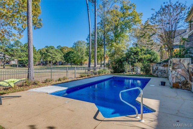 view of pool with a patio area