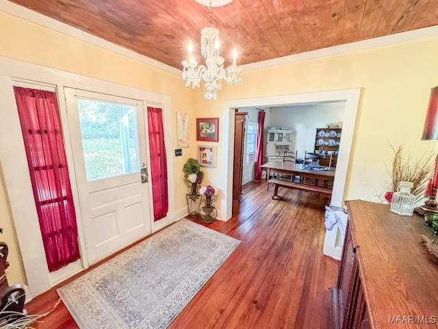 entryway with wood ceiling, dark hardwood / wood-style flooring, and a notable chandelier