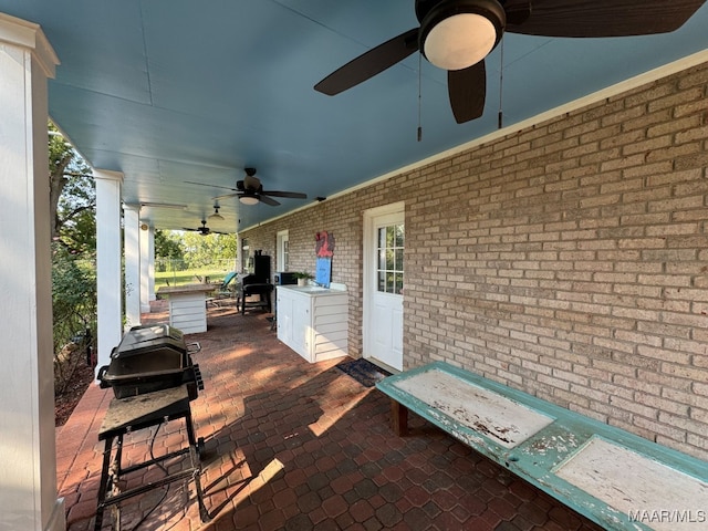 view of patio with ceiling fan