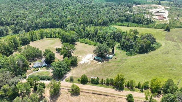 birds eye view of property featuring a rural view