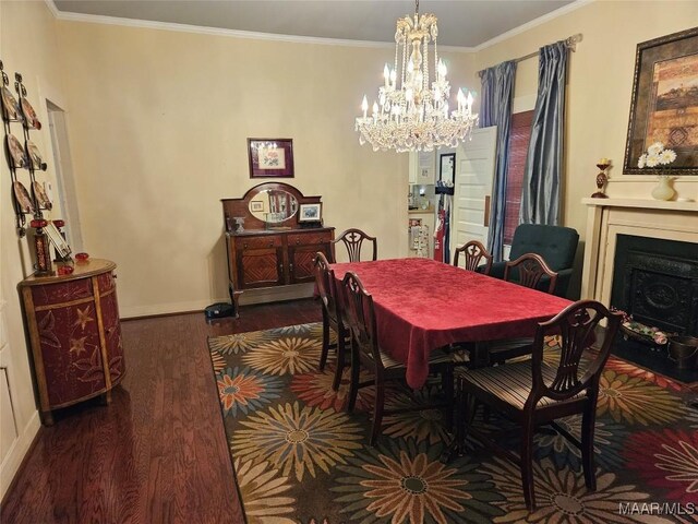 dining space with ornamental molding, dark hardwood / wood-style flooring, and a notable chandelier