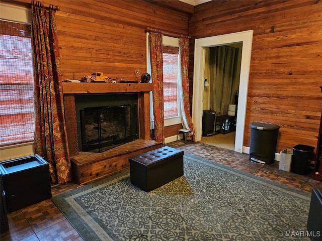 living room with wood walls