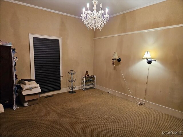 interior space featuring carpet flooring, a notable chandelier, and ornamental molding