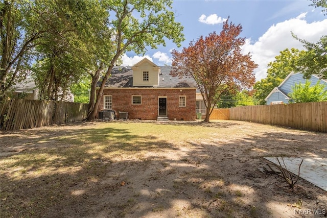 2056 Gorgas St, Montgomery, AL 36106 - rear view of property featuring entry steps, a fenced backyard, and brick siding