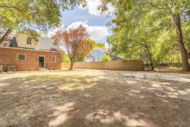 2056 Gorgas St, Montgomery, AL 36106 - view of yard featuring central air condition unit, fence, and entry steps