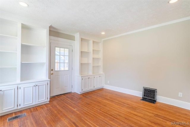 2056 Gorgas St, Montgomery, AL 36106 - unfurnished room featuring visible vents, baseboards, and light wood-style floors