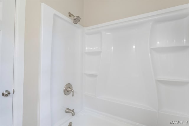 bathroom featuring shower / bath combination