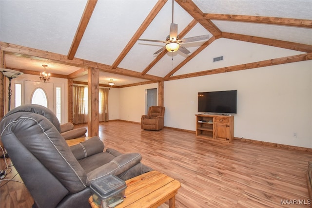 living room with light wood-type flooring, ceiling fan with notable chandelier, and vaulted ceiling with beams