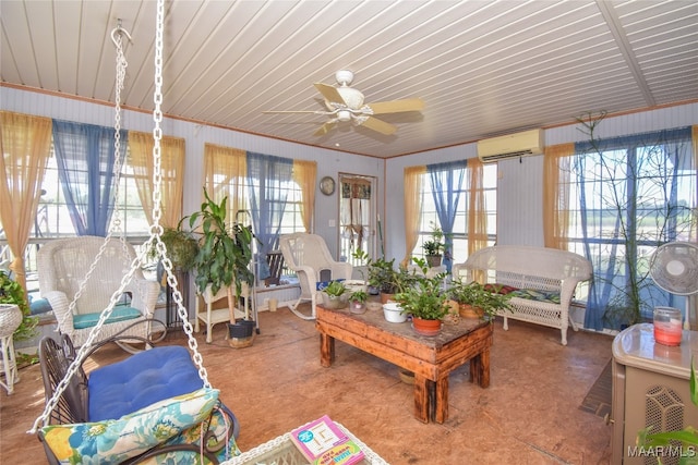 sunroom / solarium featuring ceiling fan, a wall unit AC, and plenty of natural light