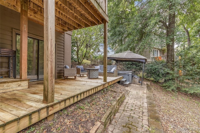 wooden deck featuring a gazebo