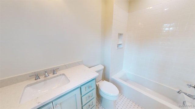 full bathroom with vanity, toilet, and  shower combination