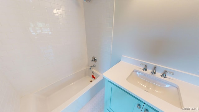 bathroom featuring vanity and shower / bath combination