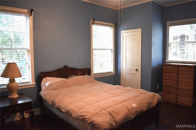 bedroom with ornamental molding