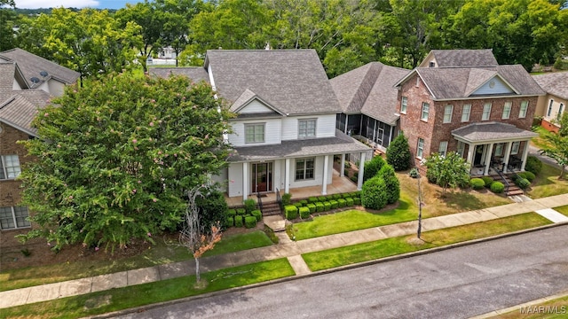 view of front of house with a front lawn and covered porch