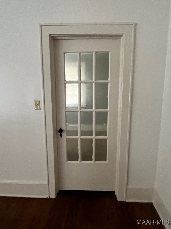 interior details featuring hardwood / wood-style flooring