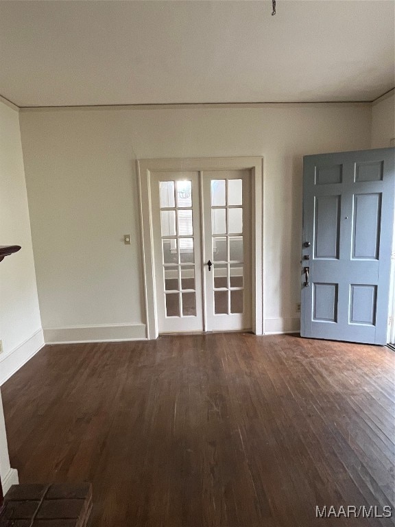 interior space featuring dark wood-type flooring and french doors