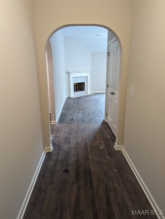 hallway featuring dark wood-type flooring