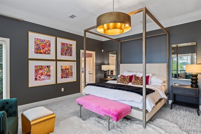 bedroom featuring baseboards, visible vents, crown molding, and carpet flooring