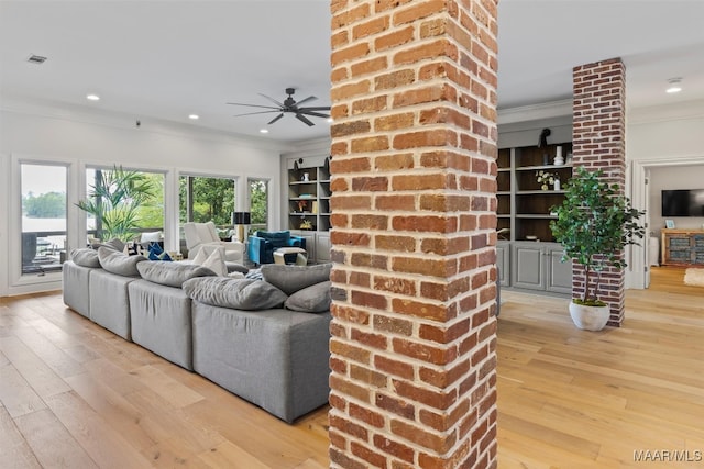 living area featuring ornamental molding, recessed lighting, ceiling fan, and wood finished floors