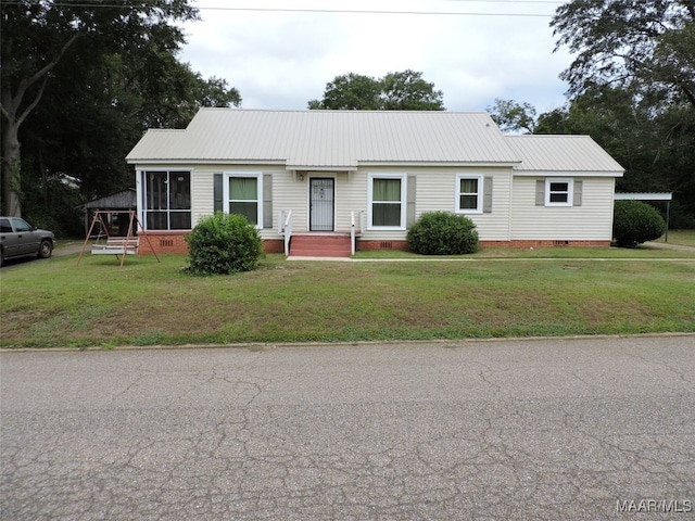 view of front of home featuring a front lawn