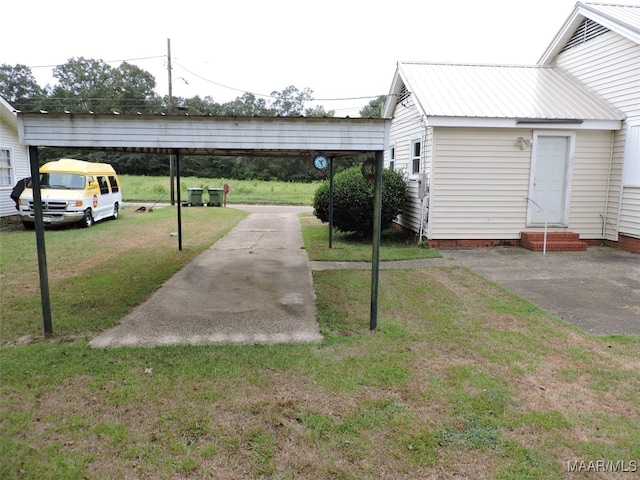 view of yard featuring a carport