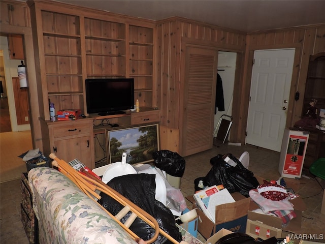 living room featuring wooden walls