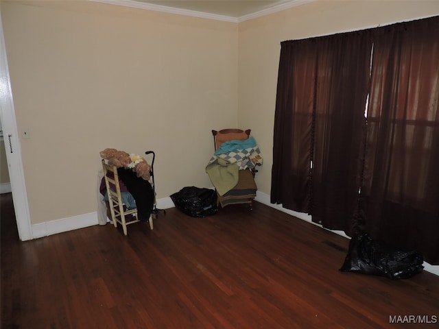 miscellaneous room with dark hardwood / wood-style floors and crown molding