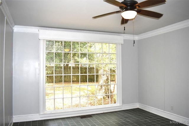 interior space featuring crown molding, plenty of natural light, and ceiling fan