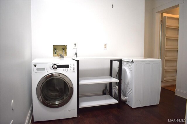 washroom with washer / dryer and hardwood / wood-style floors