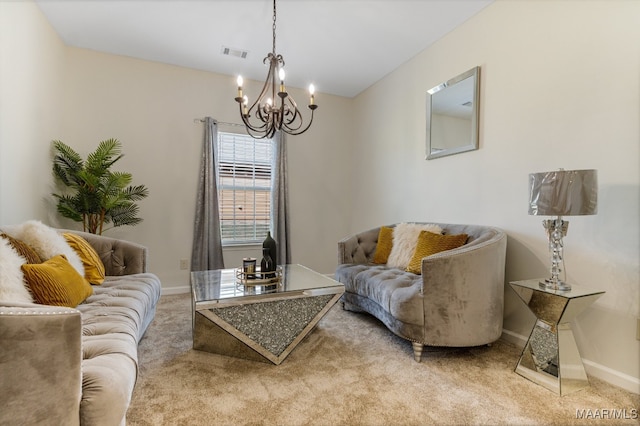 carpeted living room with an inviting chandelier