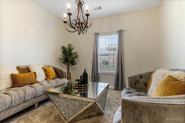 living room featuring carpet floors and a chandelier