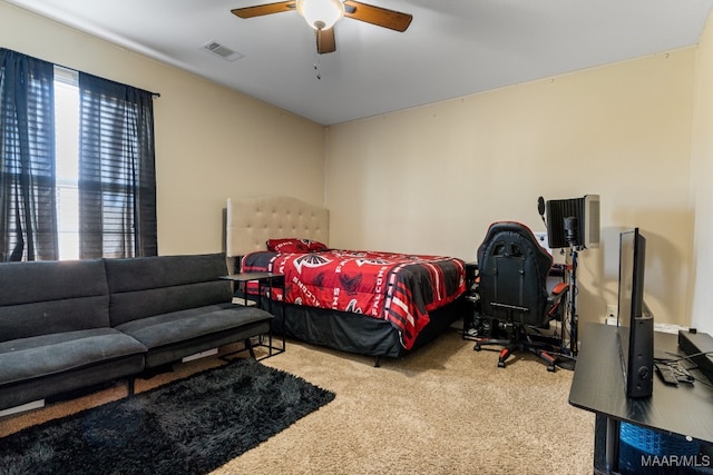 carpeted bedroom featuring ceiling fan