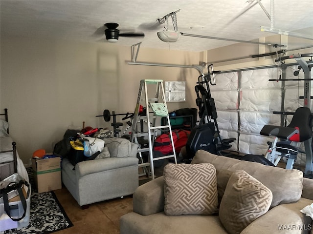 garage featuring ceiling fan and a garage door opener