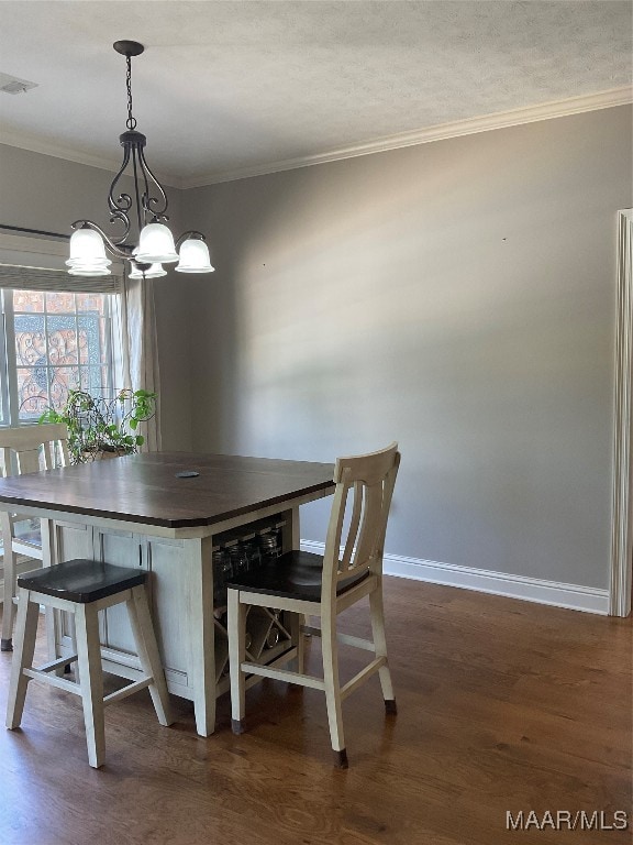 unfurnished dining area with crown molding, dark hardwood / wood-style floors, and a notable chandelier