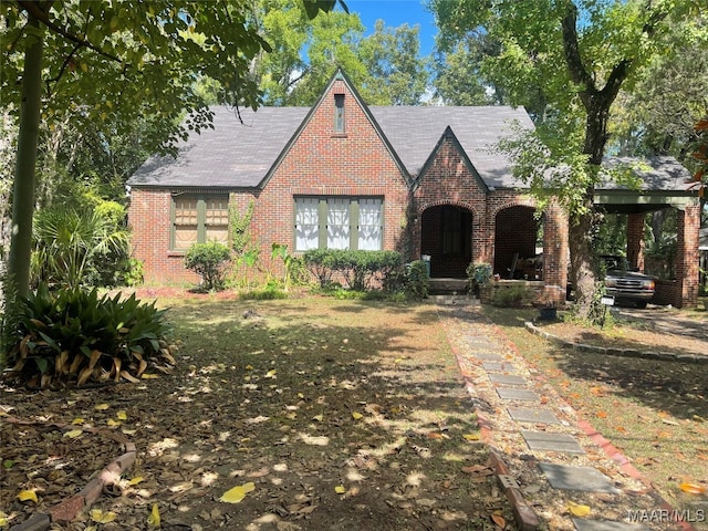 tudor house with a carport