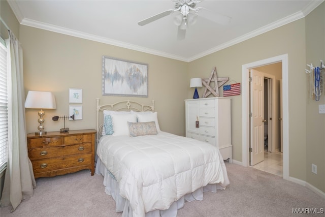 carpeted bedroom with crown molding and ceiling fan