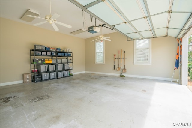 garage with a garage door opener and ceiling fan