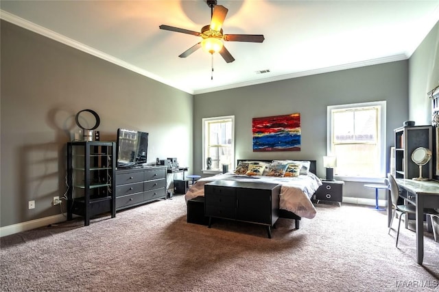 bedroom with carpet, ceiling fan, crown molding, and multiple windows