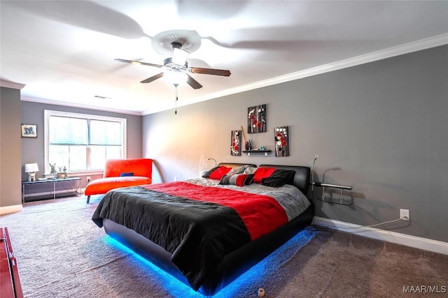 carpeted bedroom featuring ceiling fan and crown molding