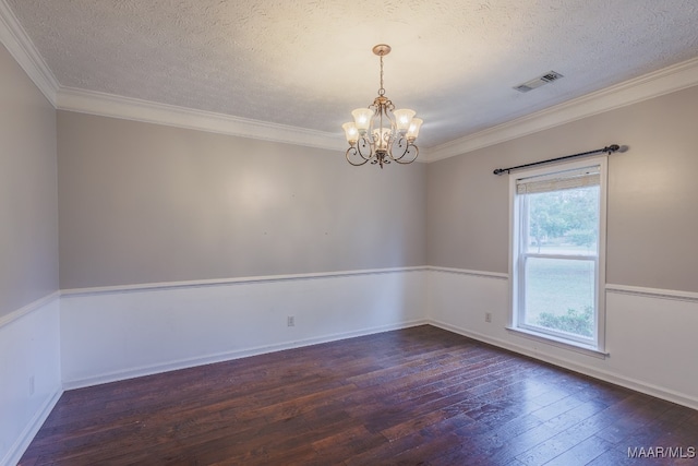 unfurnished room with crown molding, dark hardwood / wood-style flooring, a notable chandelier, and a textured ceiling