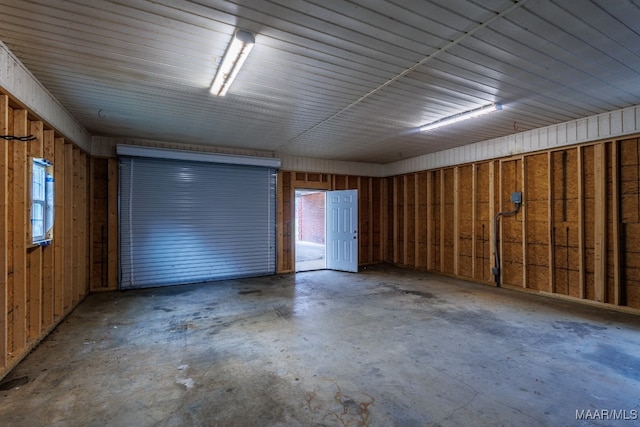 garage with wood walls