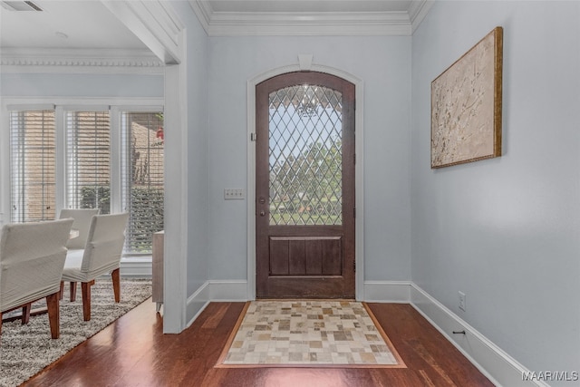 entrance foyer with wood-type flooring and ornamental molding